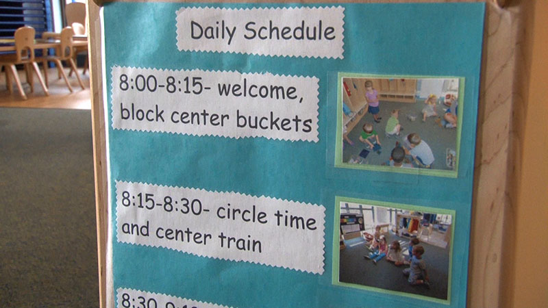 An exmaple of a daily schedule in a preschool room.  8:00 - 8:15 - welcome, block center buckets. 8:15 - 8:30 - circle time and center train.