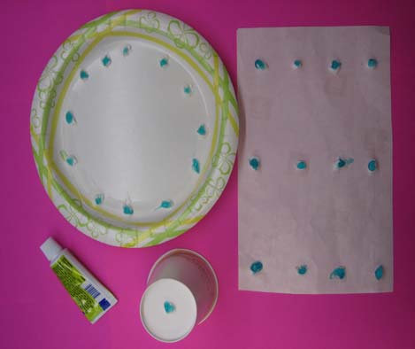 Dispense toothpaste in pea-sized amounts onto a paper plate or wax paper then transfer to each child's toothbrush in order to prevent cross-contamination of germs